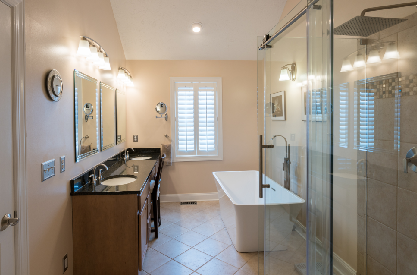 Bathroom remodeling project with freestanding tub glass shower and vanity