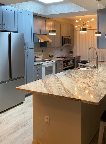 Home renovation project with custom kitchen island and stone countertop