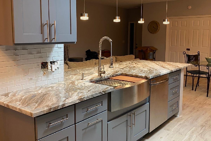 Home remodeling project with custom kitchen cabinets and large island