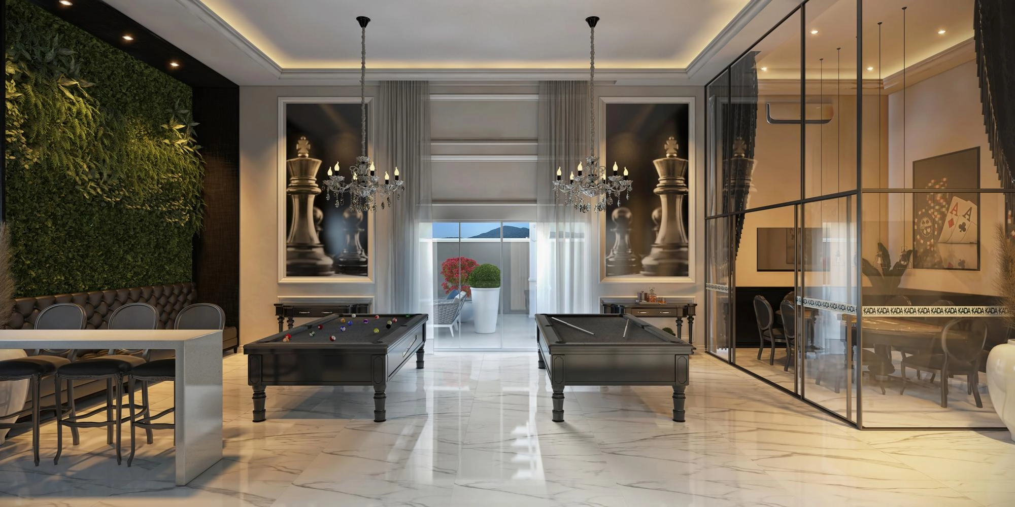 Luxury game room with pool tables, custom interior design, glass walls, chandeliers, and green accent wall