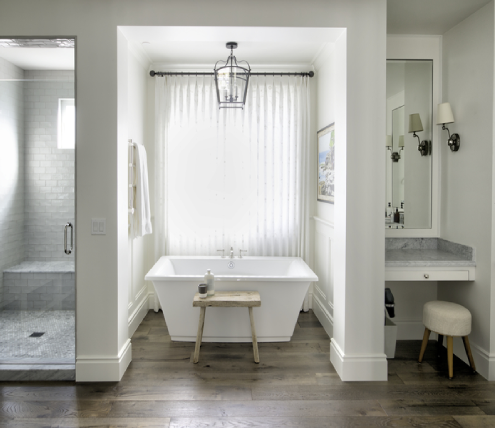 Modern bathroom remodel with a freestanding bathtub and separate shower area